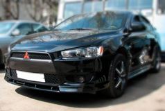 Вставка между "клыками" Mitsubishi Lancer 10