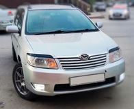 Реснички на фары для Toyota Corolla (правый руль) NZE121 2рестайлинг 2004-2006