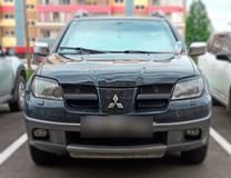 Реснички на фары MITSUBISHI OUTLANDER 2002-2006