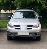 Реснички на фары MITSUBISHI OUTLANDER 2002-2006