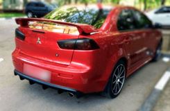 Накладка на задний бампер диффузор шагрень ПОД ОДНУ ТРУБУ Mitsubishi Lancer 10