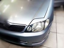 Реснички на фары для Toyota Corolla NZE 121 2000-2005 седан