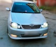 Реснички на фары для Toyota Corolla NZE 121 2000-2005 седан