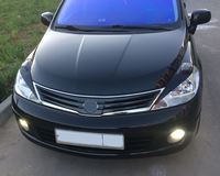 Накладки на передние фары (реснички) для Nissan Tiida (хэтчбек) 2004-2014