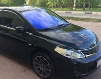 Накладки на передние фары (реснички) для Nissan Tiida (хэтчбек) 2004-2014