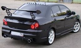 Бампер задний для Mitsubishi Lancer IX в стиле INGS Extreem под двойной выхлоп