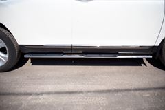 Пороги труба D75х42 овал с накладками для Toyota Highlander 2010-2013