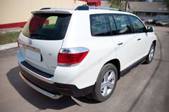 Пороги труба D75х42 овал с накладками для Toyota Highlander 2010-2013