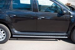 Пороги труба D75х42 овал с проступью для Renault Duster 4x2 2011-