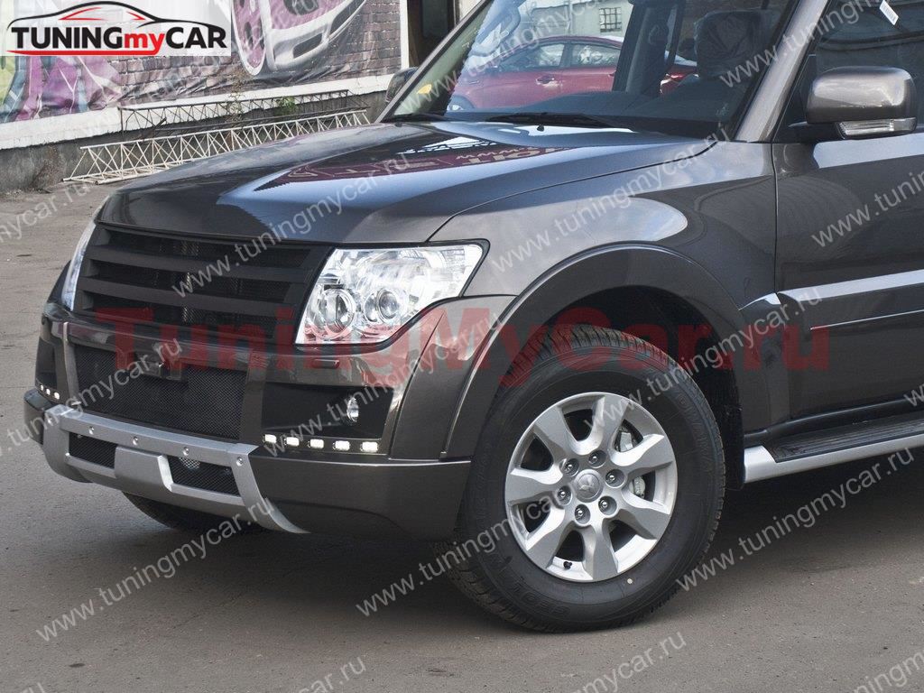 Бампер передний в сборе для Mitsubishi Pajero 4 (без ДХО)