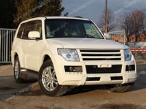 Бампер передний в сборе для Mitsubishi Pajero 4 (без ДХО)