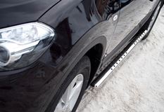 Пороги труба D75х42 овал с проступью для Nissan Qashqai 2010-2013
