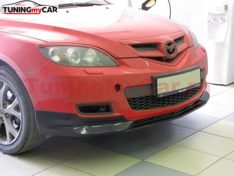Вставка между клыками для Mazda 3 HB Sport