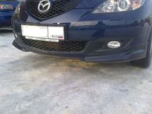 Накладка на передний бампер "Клыки" для Mazda 3 HB Touring