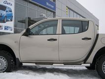 Пороги труба D76 с накладками (вариант 1) для Mitsubishi L200 2010-2013