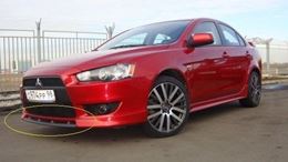 Вставка между "клыками" Mitsubishi Lancer 10