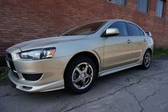 Накладка Zodiak на передний бампер Mitsubishi Lancer 10