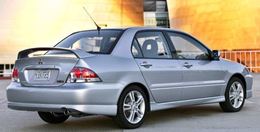 Накладка на задний бампер (юбка) Mitsubishi Lancer 9, тюнинг "Sport 2.0" (штатный-заводской обвес Спорт 2.0)