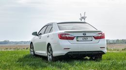 Накладка на задний бампер (диффузор) для Toyota Camry XV50  2011-2014