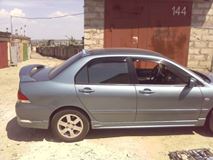 Накладки на внешние пороги EGR-style на Mitsubishi Lancer 9