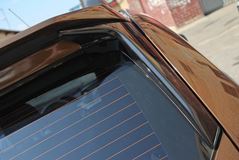 Спойлер очищающий стекло Renault Duster с 2011 г.в. (крашенный в цвет авто)