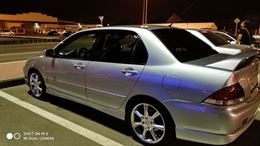 Накладки на внешние пороги Mitsubishi Lancer 9