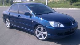 Накладки на внешние пороги Mitsubishi Lancer 9