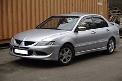 Накладки на внешние пороги Mitsubishi Lancer 9