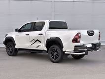 Защита заднего бампера уголки d76 секции-d63 прямая для Toyota Hilux Black Onyx 2020-