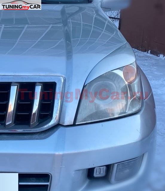 Накладки на фары крашеные в серебристый Toyota Land Cruiser Prado 120 2002-2009 (цвет 1D4 SILVER)