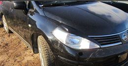Накладки на передние фары (реснички) Nissan Tiida 2004-2013