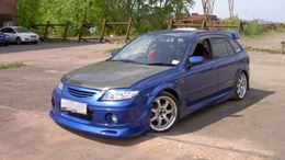 Реснички на фары для Mazda Familia BJ5W рестайлинг 2000-2003