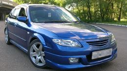 Реснички на фары для Mazda Familia BJ5W рестайлинг 2000-2003