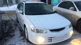 Реснички на фары для Mazda Familia 1998-2000