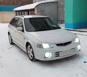 Реснички на фары для Mazda Familia 1998-2000