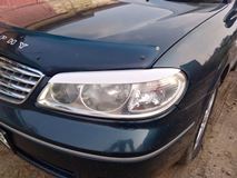 Реснички на фары Nissan Bluebird Silphy G10 2000-2005 / Almera N16 2000-2006