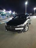 КЛЫКИ на передний бампер для Mitsubishi Lancer X 2007-2010