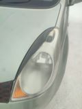 Реснички на фары Nissan Note E11 2005-2008