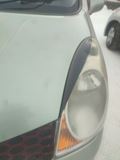 Реснички на фары Nissan Note E11 2005-2008