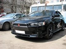 Тюнинг комплект накладок  на передний бампер для Mitsubishi Lancer 10 2007-2010