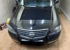 Накладки на передние фары (реснички) для Nissan Almera Classic 2007-2012